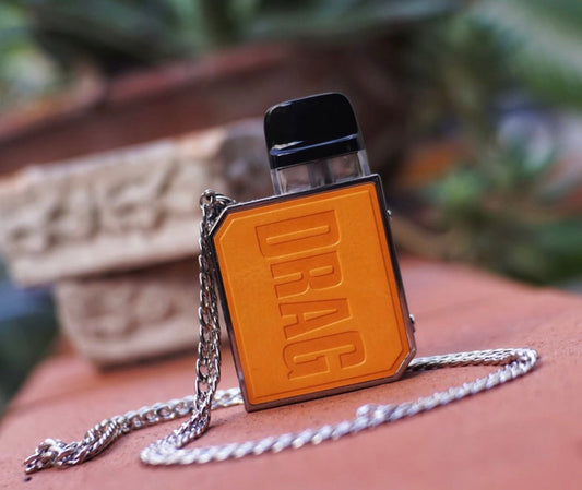 VOOPOO Drag Nano 2 Pod System in orange with chain, compact vaping device ideal for portability and style in Food, Beverages & Tobacco category.